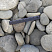 Kamenclub.ru: Галька речная плоская (серо-белая) фр. 70-120 мм. купить  в Крыму галька галечник речной серый, белый окатанная плоская  природная галька 9000 руб/т   фото КАМЕНЬ КЛУБ